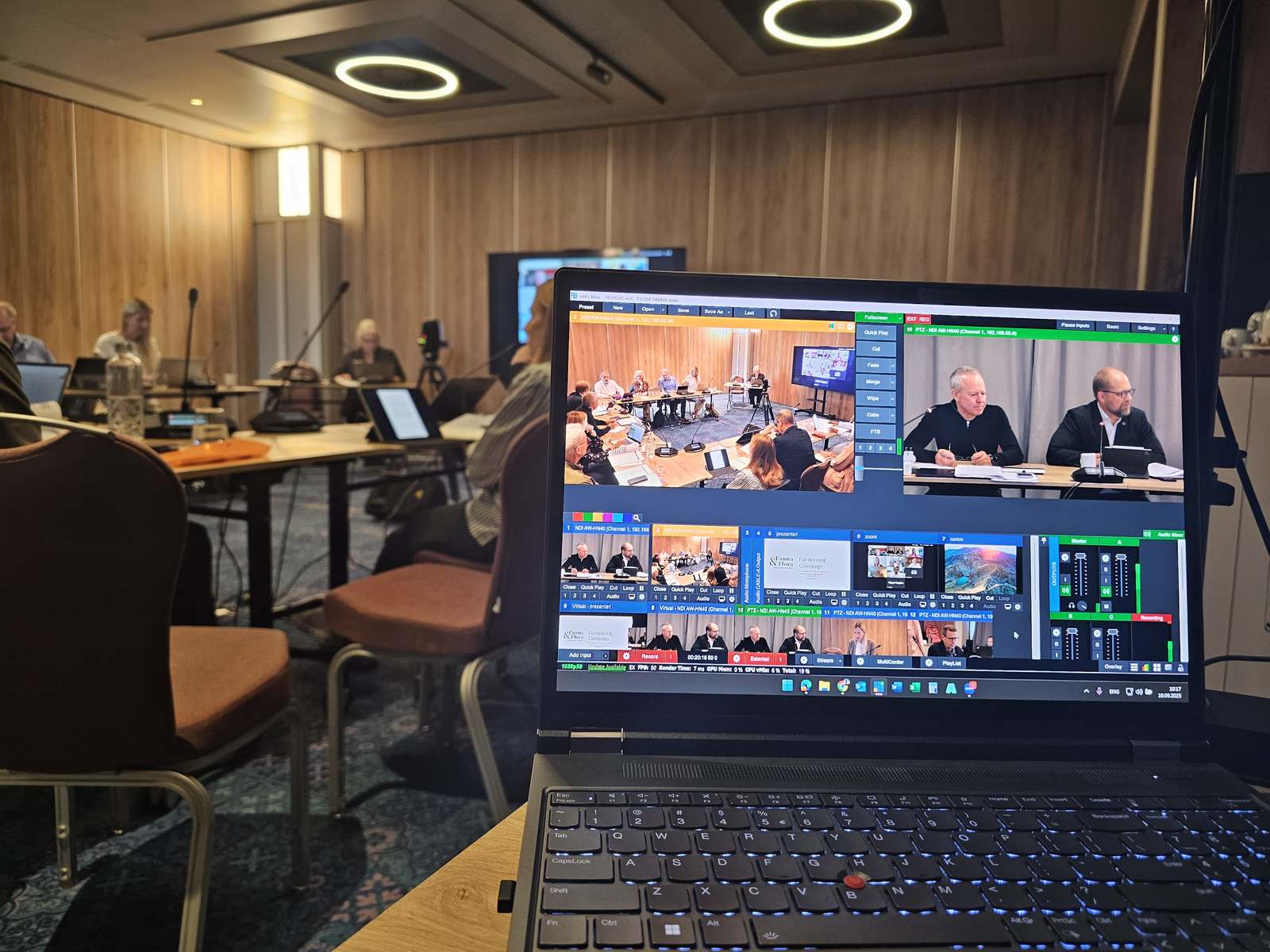 Online conference on Zoom: multiview with speakers and participants in the room